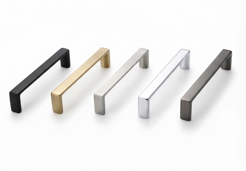 Five square-profile rectangular cabinet pulls in matte black, satin gold, brushed nickel, polished chrome and gunmetal